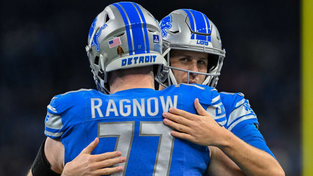 Lions quarterback Jared Goff, center Frank Ragnow celebrate win